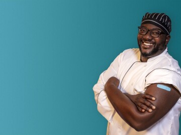 smiling-male-doctor-with-his-flu-shot.jpg