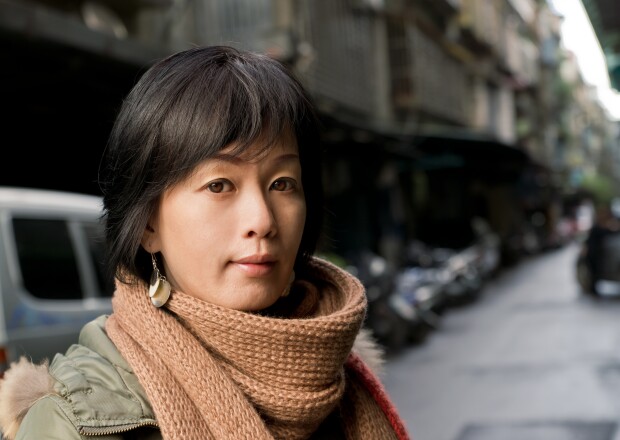 Woman with scarf in the street